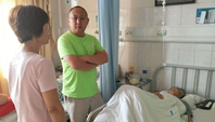 “扶危济困”丁伟民
